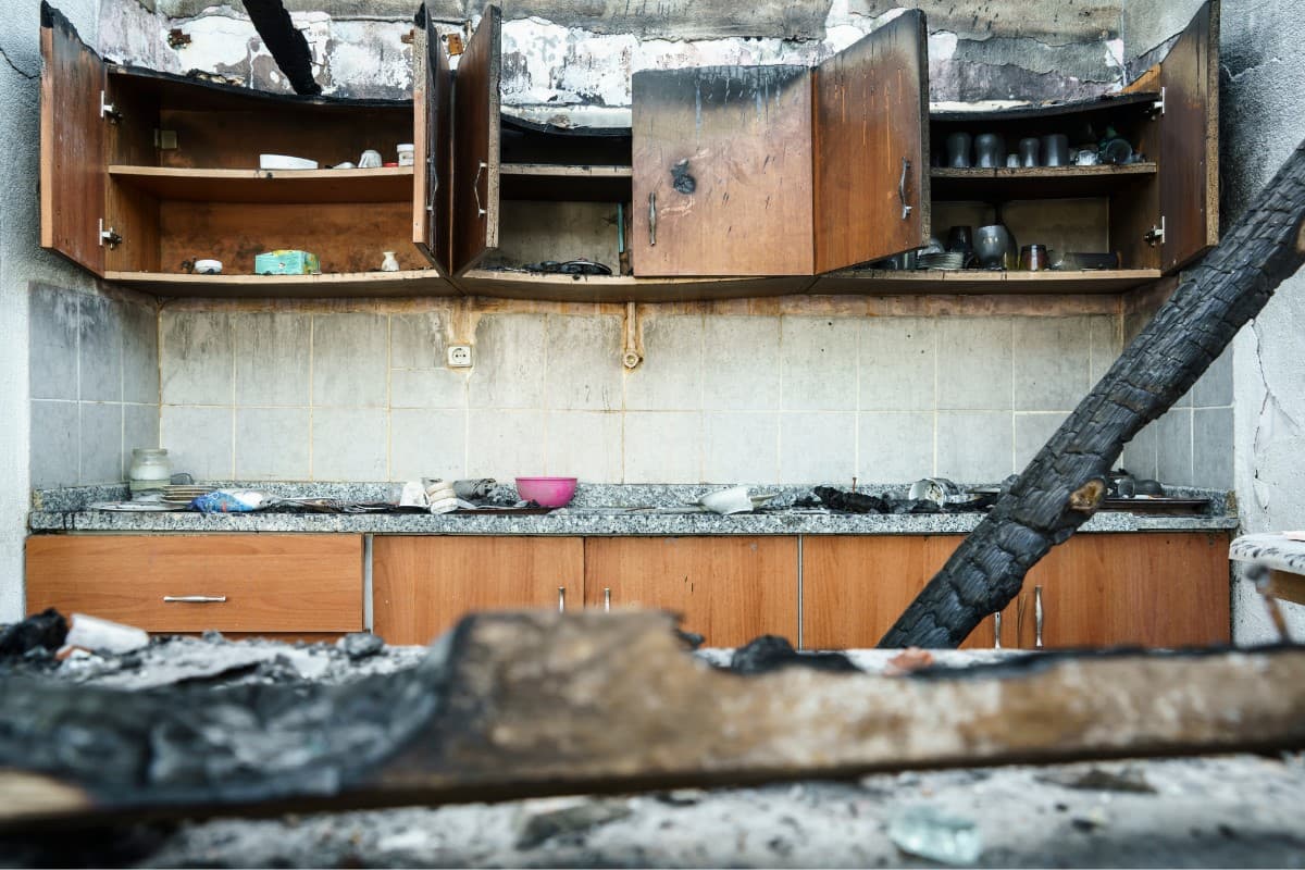 Image of charred kitchen needing fire damage restoration services.